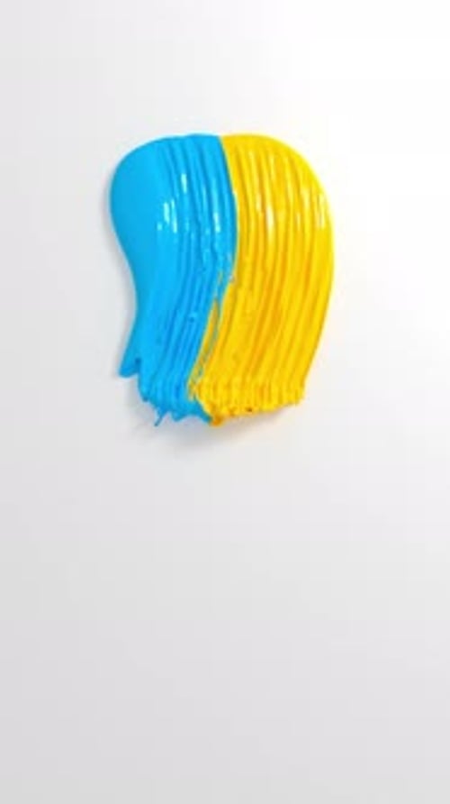 Glossy blue yellow paint smear