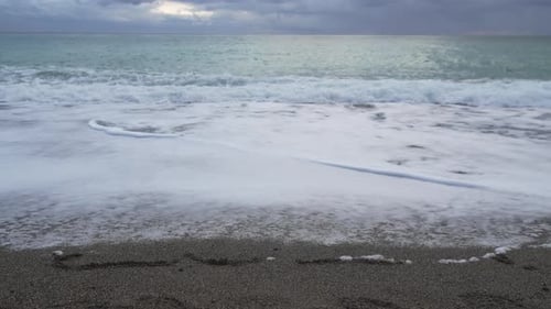 Happy New Year 2025 Hand Written Digit 2024 Washed By Wave on the Sea Beach Abstract Background of