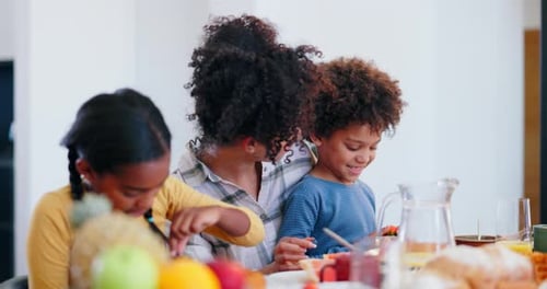 Mother and Children Enjoying Fruits at Breakfast