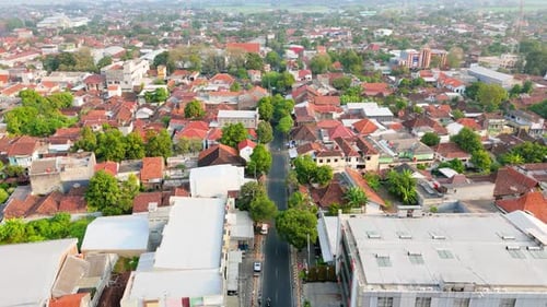 Aerial view of urban landscape with city house and street in the middle