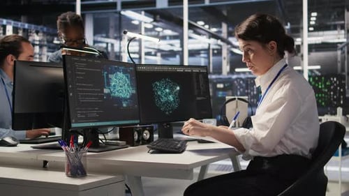 Data Analysts Coding in a Bright Tech Office