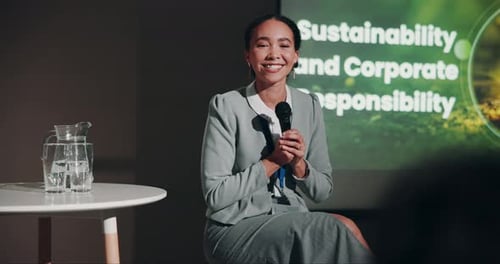 Woman Speaking at Corporate Sustainability Conference