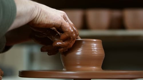 Working With Clay In Ceramic Workshop 13