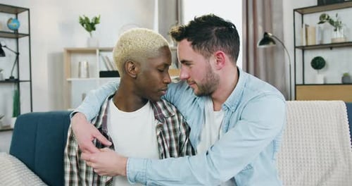 Affectionate Couple Embrace in Living Room
