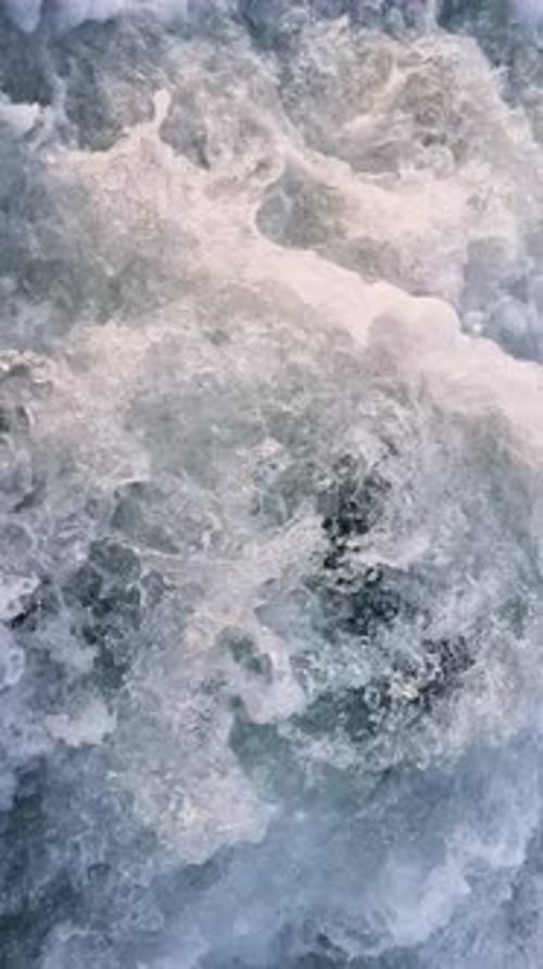 Churning, Frothy Ocean Water with Turbulent Currents