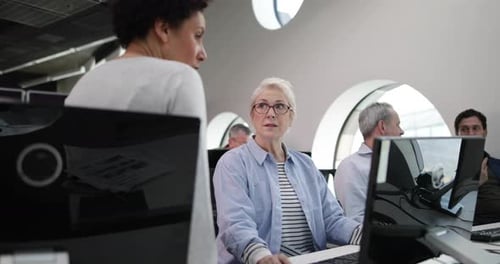 Senior woman on computing course
