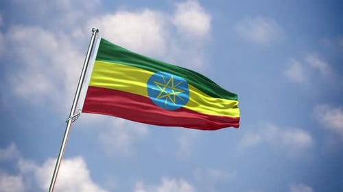 Waving Flag of Ethiopia on a Pole in Blue Sky