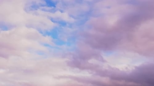 Pink Clouds Drifting Slowly Through Sky