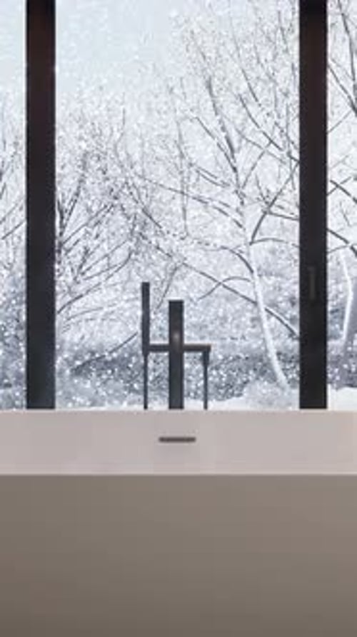 Modern Bathroom Bathtub with Falling Snow Window View