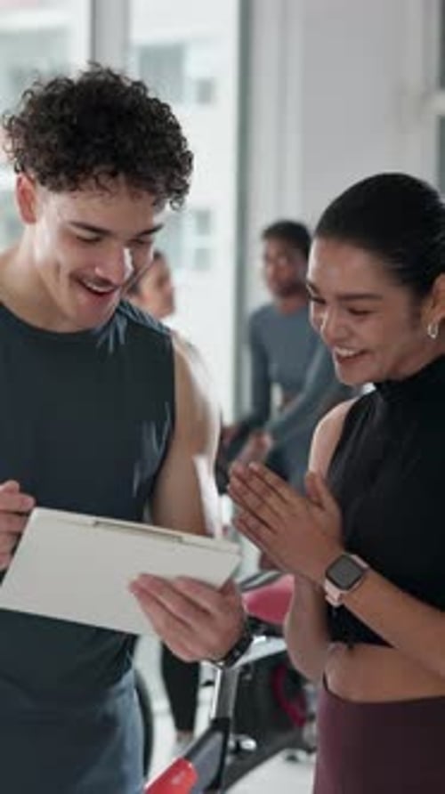 Gym, membership and people with clipboard, talking and explaining info for fitness class or session