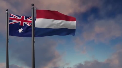 Australia and Netherlands Flags Waving in Blue Sky