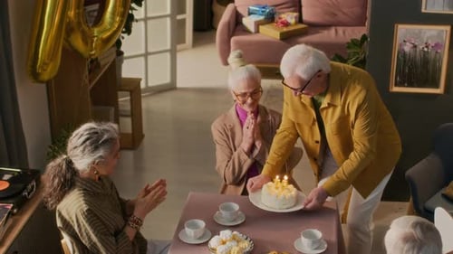 Seniors Celebrate Birthday with Cake and Good Cheer
