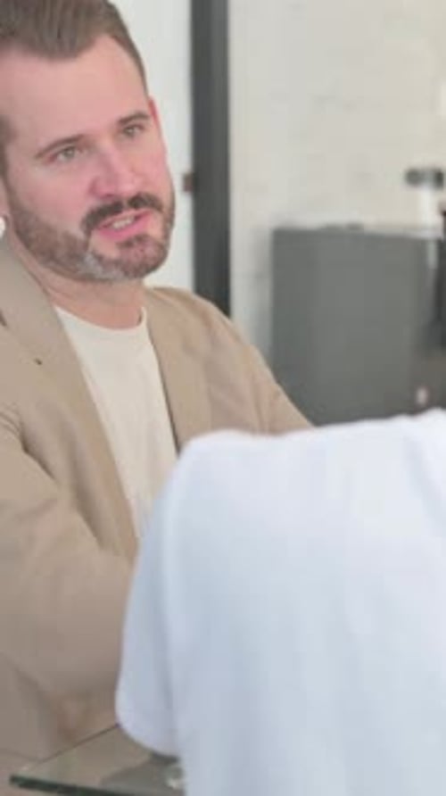 Close up of Angry Man Talking in Meeting, Mixed Race Team, vertical video