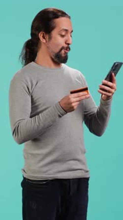 Vertical Video Man Adding Payment Method on Website Doing Online Shopping