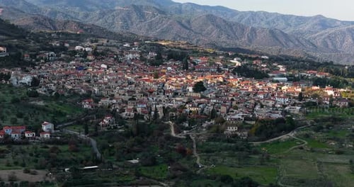 Aerial drone view of Lefkara village with central church and traditional houses in mountain landscap