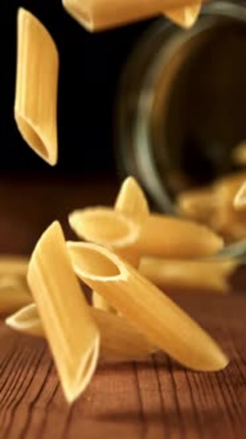 Super Slow Motion Dry Penne Pasta Filmed on a Highspeed Camera at 1000 Fps