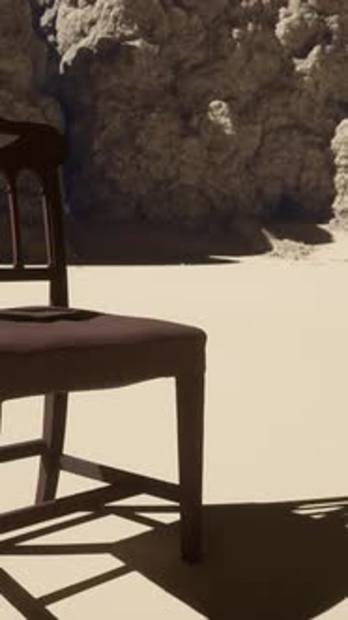 Animated Chair in Desert with Shifting Shadows Time-lapse