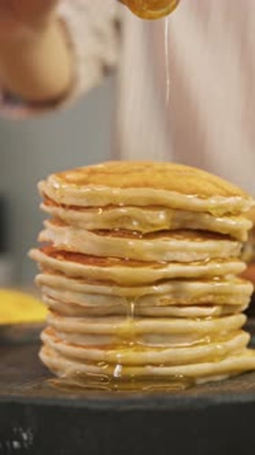 Before Serving to the Customer Delicious Pancakes Placed One on Top of the Other are Poured with