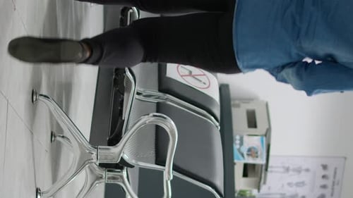 Vertical Video Multiethnic Group of People with Face Masks Sitting in Waiting Area