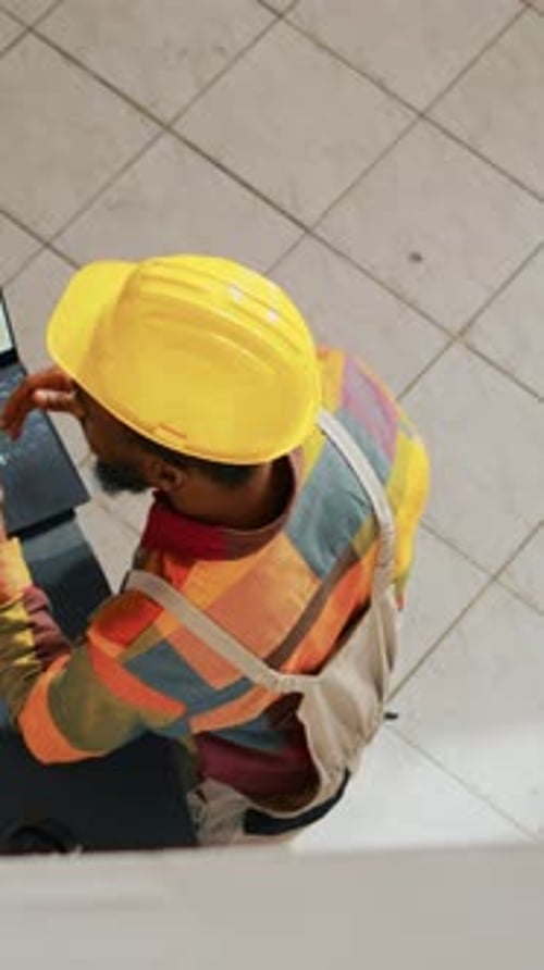 Vertical Video Team of People Analyzing Logistics List on Papers