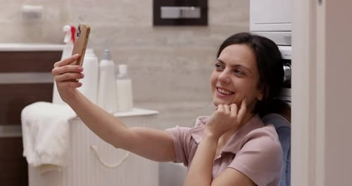 Woman Making Video Call in Modern Bathroom