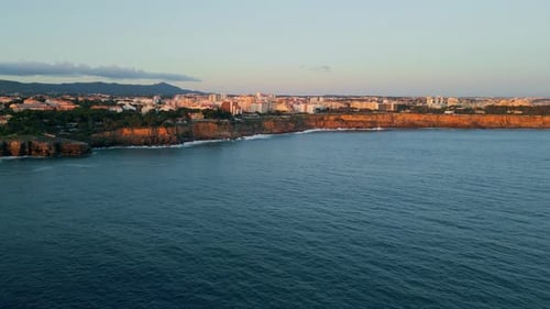 Aerial View Coastal Resort Town with Calm Ocean. Building Complex Placed On