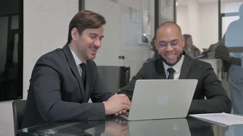 Smiling Men Video Conference in Modern Office