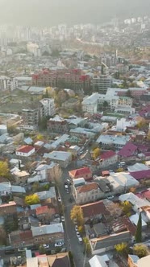 Vertical Video Aerial Autumn Splendor Tbilisi Georgia's Most Beautiful City