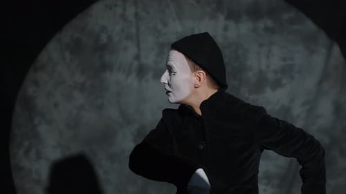 Female Mime Artist Performing Comedian Criminal Scene on Stage