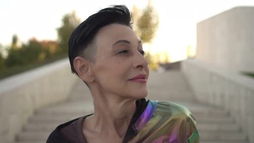Woman Posing with Short Hair Outdoors in City