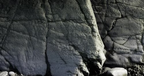 Exploring the Intricate Textures of Ancient Rocks Along a Secluded Coastline