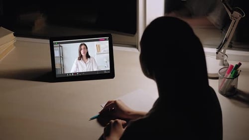 Student Attending Online Class Late at Night