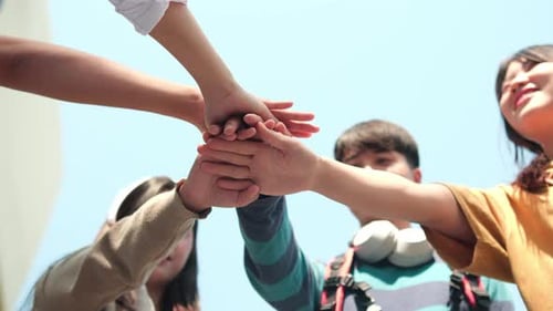 Friends Celebrate Togetherness with Hand Stack