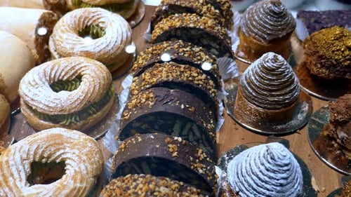 An Array of Baked Goods Including Pastries is Showcased in the Bakery