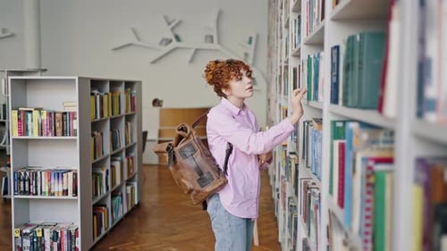 Young Woman Browsing Books in Library