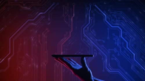 A Hand Holding Smartphone on the PCB Printed Circuit Board Background Mobile Application or