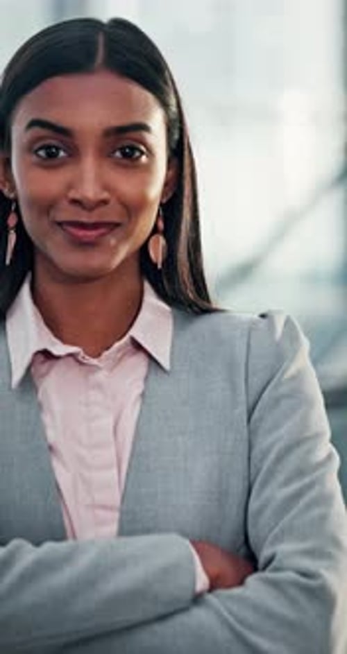 Corporate, woman and face with arms crossed in office for professional. business career or ambition