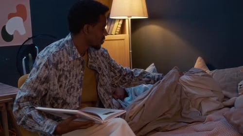 Loving Parent Reading to Child at Bedtime