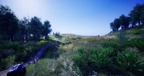 Lebendige Landschaft mit sanften Hügeln und klarem blauem Himmel im Frühling