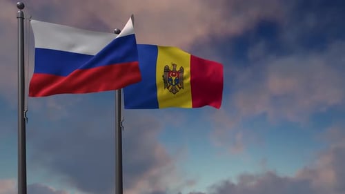Russian and Moldovan Flags Waving Against Cloudy Sky