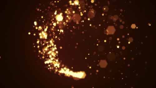 Golden glitter trail with glowing particles