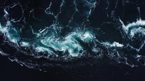 Waves of Water of the River and the Sea Meet Each Other During High Tide and Low Tide