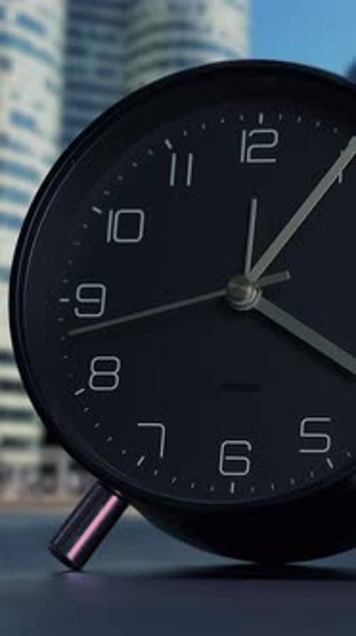 Stylish Black Alarm Clock Featuring a Modern and Elegant Background Design for a Chic Look