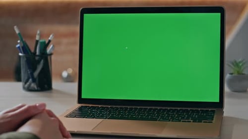 Unrecognizable Entrepreneur Looking Green Screen Laptop at Workplace Close Up