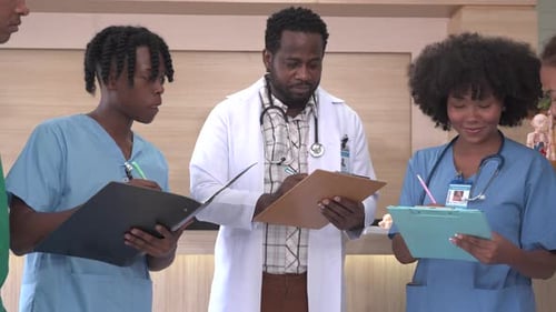 Group of doctor write on clipboard in the ward, Healthcare professionals