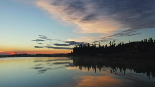 Sunrise on a beautiful lake in the forest