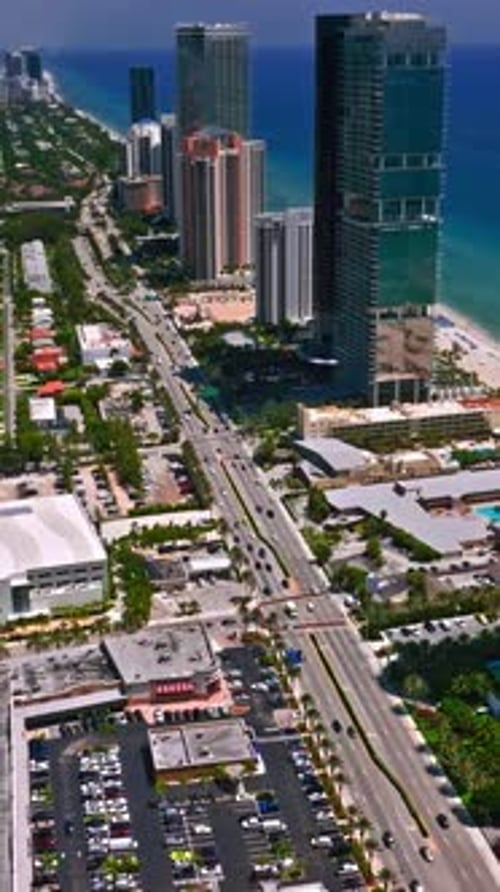Aerial view of Miami coastline showcasing urban skyline and beach