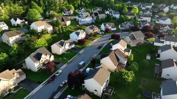 Traditional american housing area with single Family homes at Sunset ...