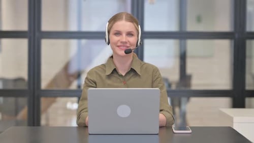 Smiling Woman Working in Call Center