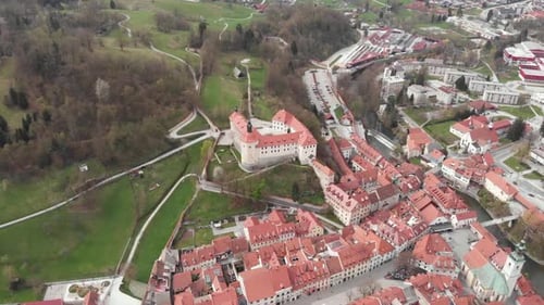 Closing up drone shot of a castle and museum Skofja Loka, Slovenia. A historic medieval castle in Sl